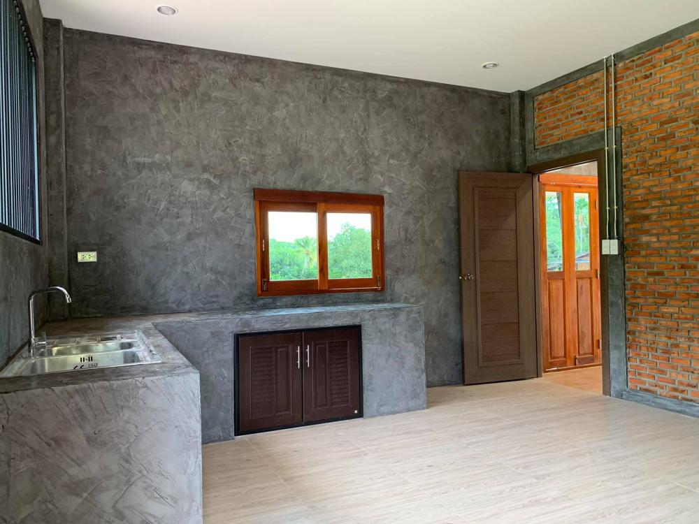 บ้านสวนสไตล์โมเดิร์นผสนมลอฟท์ โชว์ลายอิฐ ให้อารมณ์ผ่อนคลาย