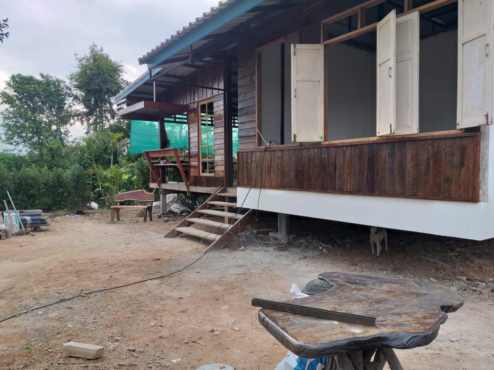 บ้านไม้เก่าหลังคาผสมผสานสไตล์โมเดิร์น