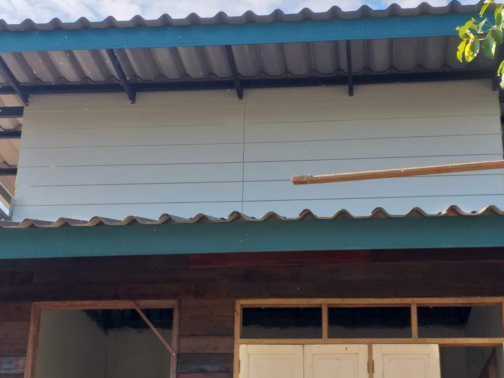 บ้านไม้เก่าหลังคาผสมผสานสไตล์โมเดิร์น