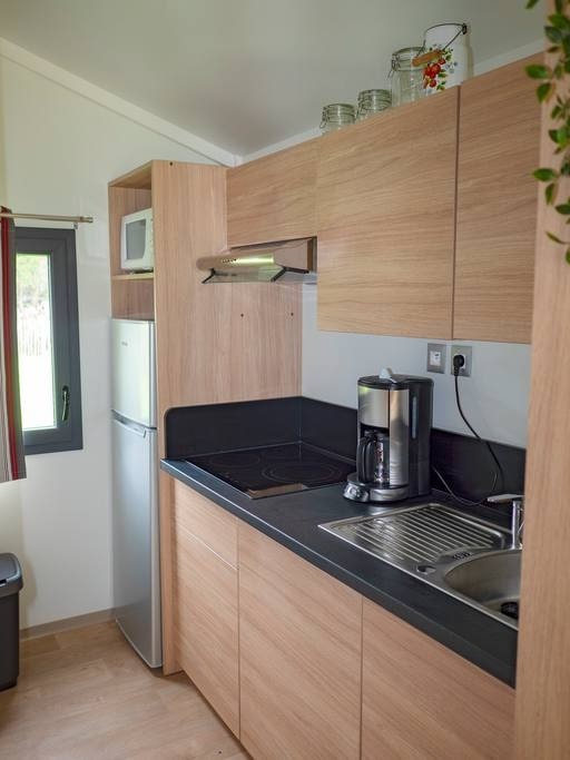 แบบบ้านไม้ชั้นเดียวหลังเล็ก บรรยากาศอบอุ่น พื้นที่ 38 ตารางเมตร