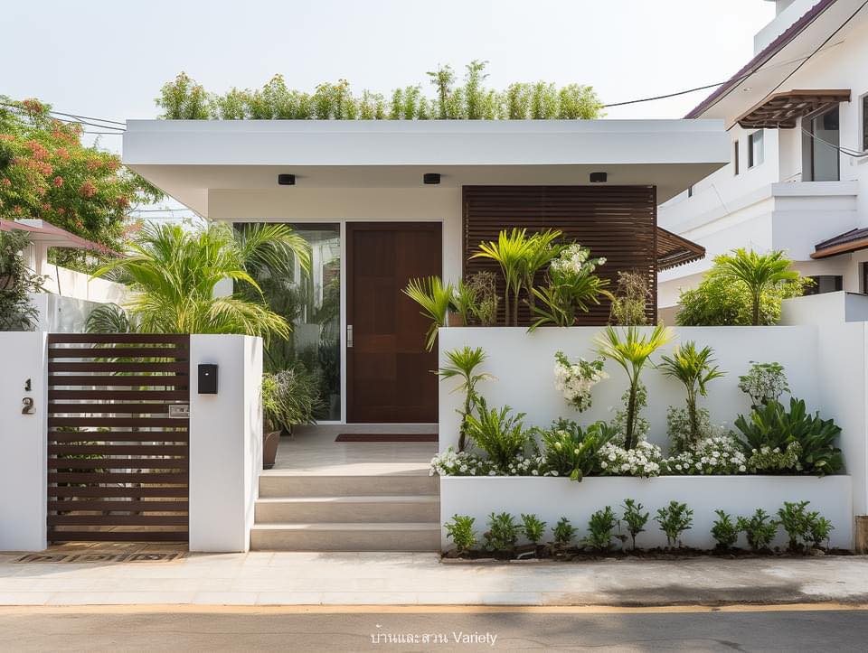 ไอเดียตกแต่งรอบรั้วบ้านด้วยดอกไม้และกระถางต้นไม้ รูปที่ 22