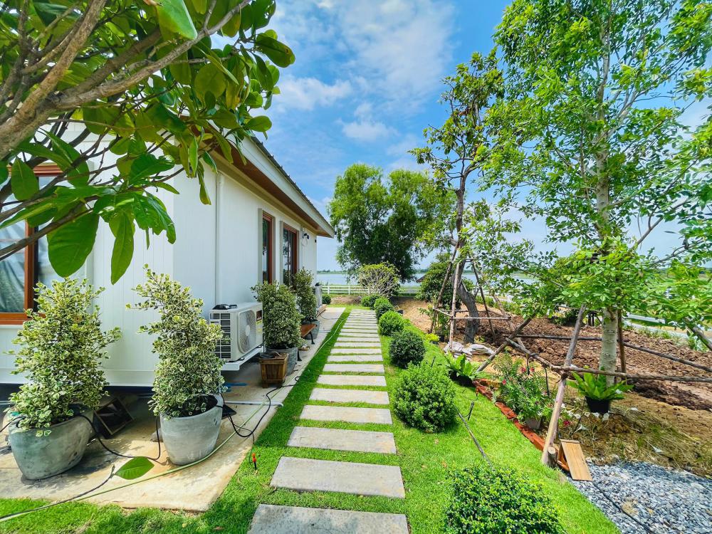 ไอเดียบ้านสวยในสวนพื้นที่กว้าง จัดสวนให้น่าอยู่ รูปที่ 6