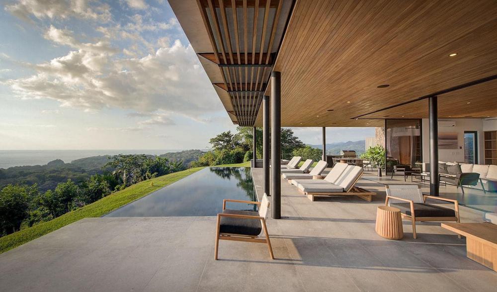 แบบบ้านทรงกล่องริมทะเลภูเขา ด้านล่างโปร่งลมผ่าน รูปที่ 18