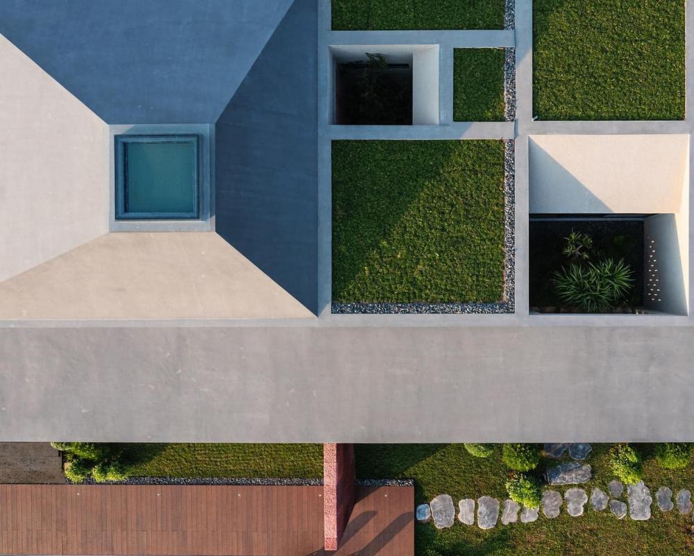 ไอเดียแบบบ้านพักตากอากาศสไตล์โมเดิร์นทรงกล่อง ออกแบบให้ลมเข้าออกถ่ายเทริมน้ำ รูปที่ 12