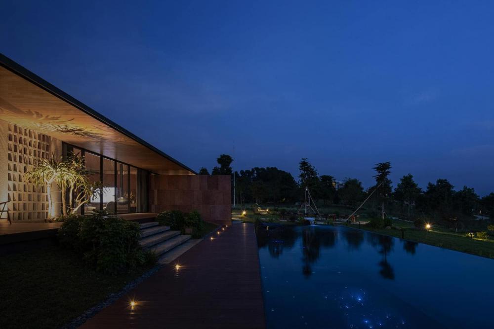 ไอเดียแบบบ้านพักตากอากาศสไตล์โมเดิร์นทรงกล่อง ออกแบบให้ลมเข้าออกถ่ายเทริมน้ำ รูปที่ 15