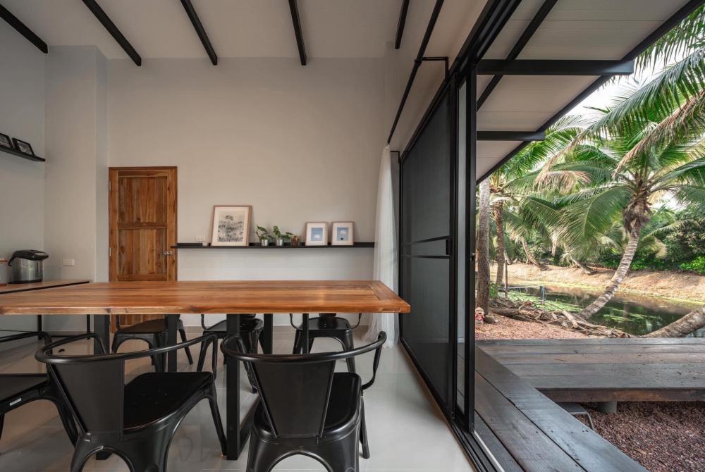 บ้านปูนชั้นเดียวกลางสวนมะพร้าว ออกแบบได้น่าอยู่และลงตัว รูปที่ 9