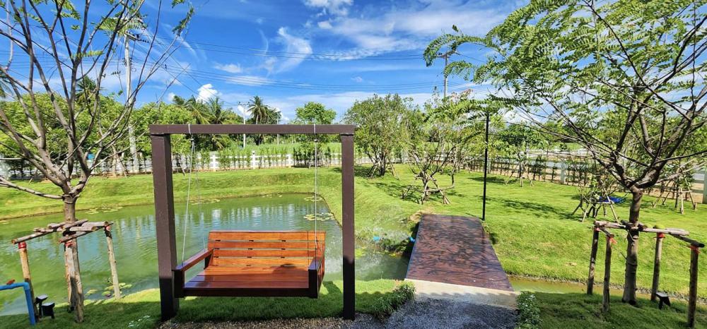 ไอเดียบ้านสวนสวย ล้อมด้วยสวนพื้นที่สีเขียวน่าอยู่มาก รูปที่ 12