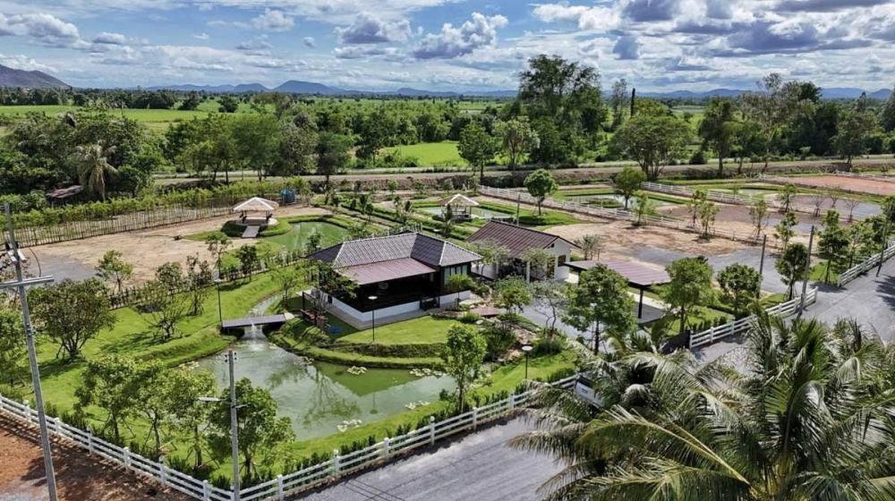 ไอเดียบ้านสวนสวย ล้อมด้วยสวนพื้นที่สีเขียวน่าอยู่มาก รูปที่ 22