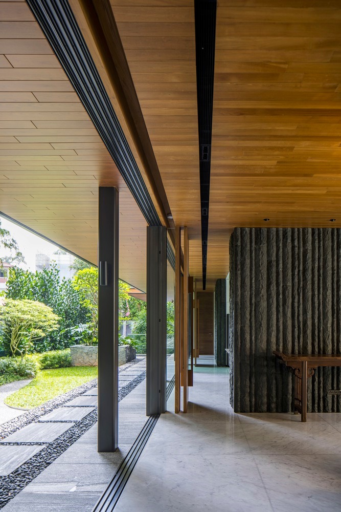 บ้านโมเดิร์นทรงกล่องผสานไม้และลายไม้ โดยสถาปนิกต่างชาติ รูปที่ 15