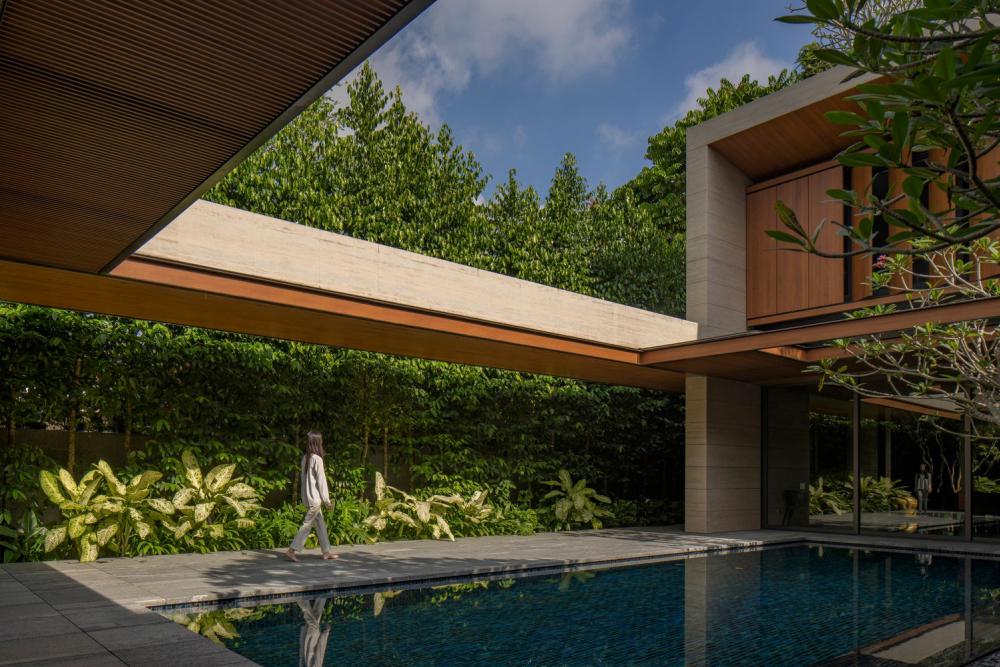 บ้านโมเดิร์นทรงกล่องผสานไม้และลายไม้ โดยสถาปนิกต่างชาติ รูปที่ 7