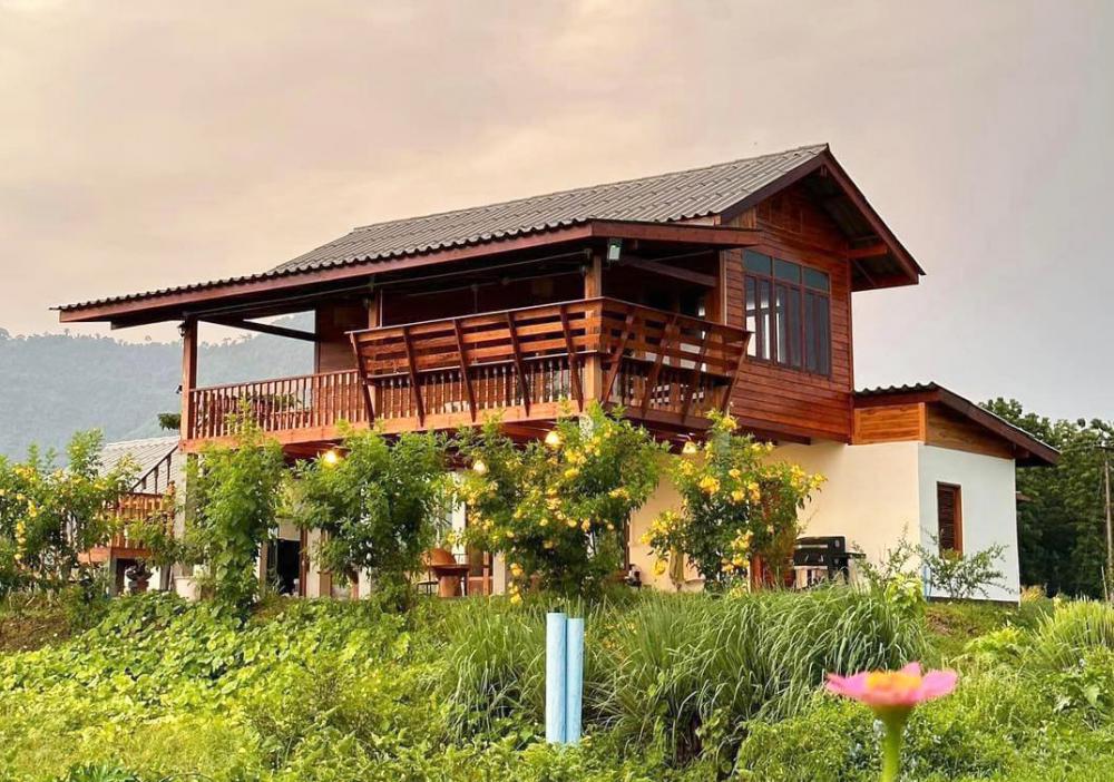 บ้านสวนพิมพ์สุข บ้านไม้สองชั้นใต้ถุนสูง ในบรรยากาศสุดสงบ แวดล้อมด้วยธรรมชาติของทิวเขาเนินมะปราง ในจังหวัดพิษณุโลก รูปที่ 5