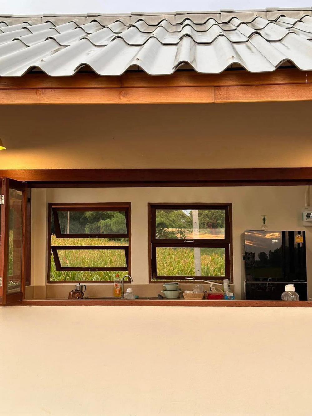 บ้านสวนพิมพ์สุข บ้านไม้สองชั้นใต้ถุนสูง ในบรรยากาศสุดสงบ แวดล้อมด้วยธรรมชาติของทิวเขาเนินมะปราง ในจังหวัดพิษณุโลก รูปที่ 22