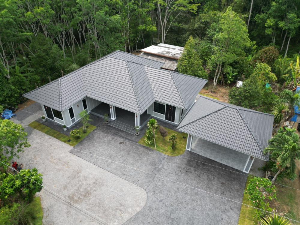 บ้านสไตล์คอนเทมโพรารี่ ขนาด 3 ห้องนอน 3 ห้องน้ำ พื้นที่รวม 212 ตร.ม. รูปที่ 4