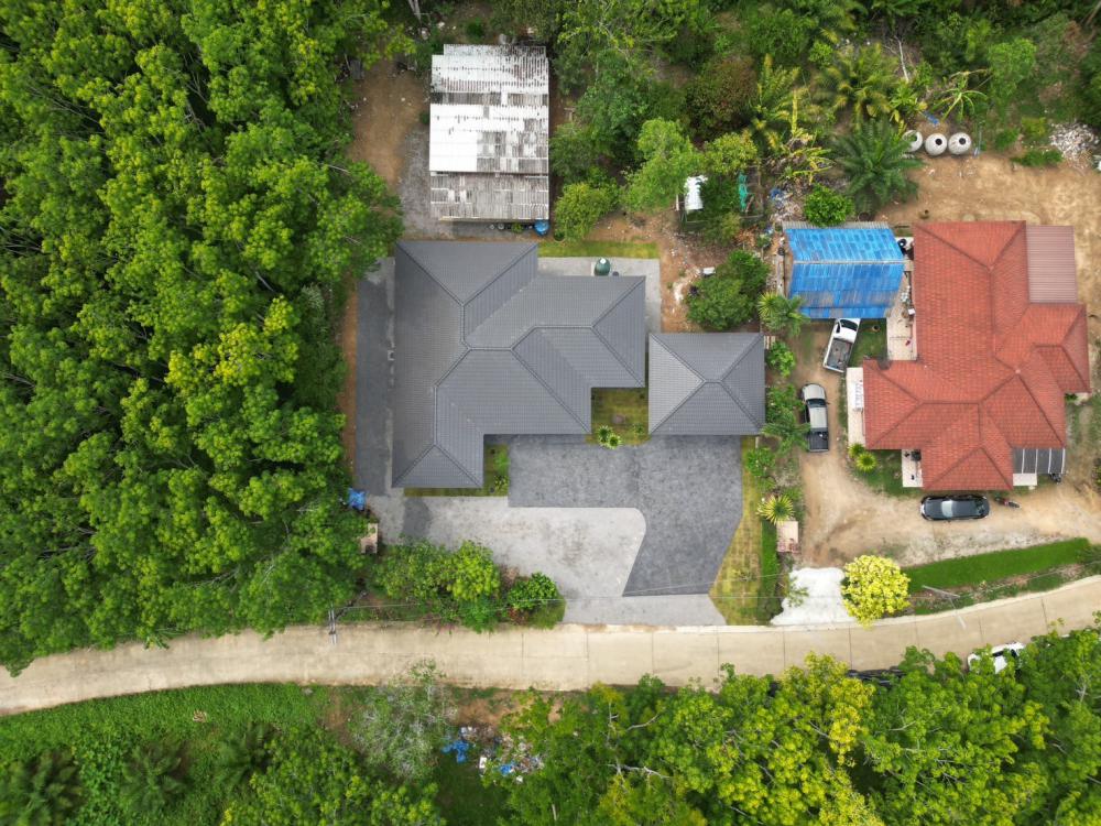 บ้านสไตล์คอนเทมโพรารี่ ขนาด 3 ห้องนอน 3 ห้องน้ำ พื้นที่รวม 212 ตร.ม. รูปที่ 9