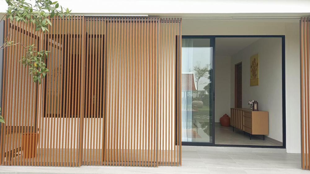 ไอเดียบ้านทรงกล่องสไตล์โมเดิร์นพร้อมจัดสวนปลูกต้นไม้ รูปที่ 7