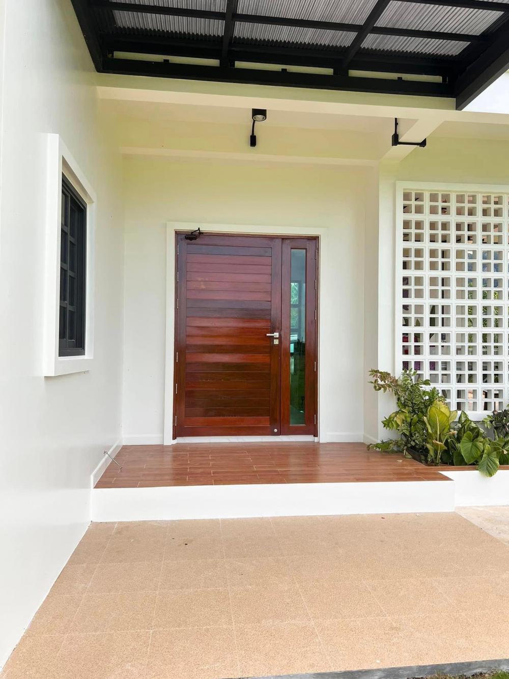 ไอเดียบ้านสวย 2 ชั้นริมทุ่งด้านล่างโปร่งรับลม รูปที่ 15