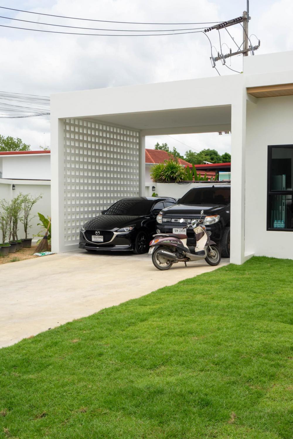 บ้านชั้นเดียวโมเดิร์น รูปทรงกล่อง ขนาด 3 ห้องนอน 2 ห้องน้ำ ตกแต่งในสไตล์โทนสีขาว มินิมอล ที่เน้นความเรียบง่าย รูปที่ 8