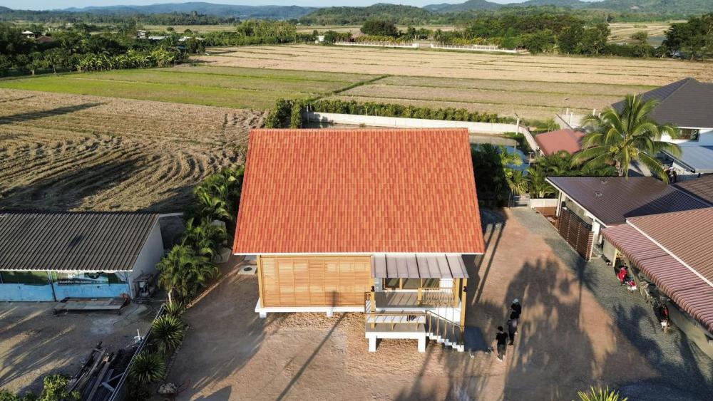 บ้านบ่ะขามป้อม พื้นที่อบอุ่นในชุมชนเงียบสงบ ผลงานการออกแบบโดย MAIPUN - ไม้ปั้น รูปที่ 16